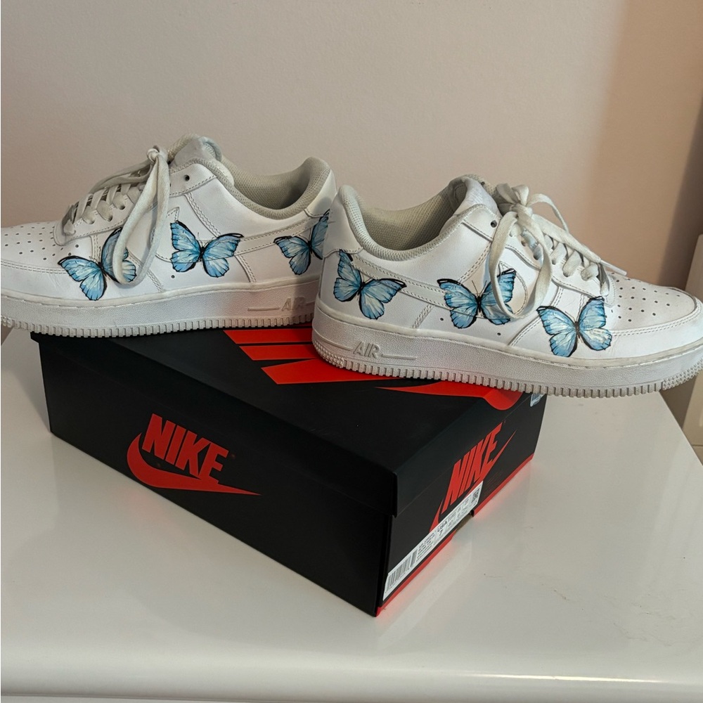 Custom Drip Air Force 1s with blue butterflies